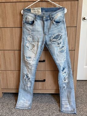 Industrial Indigo Light Wash Distressed Skinny Jeans